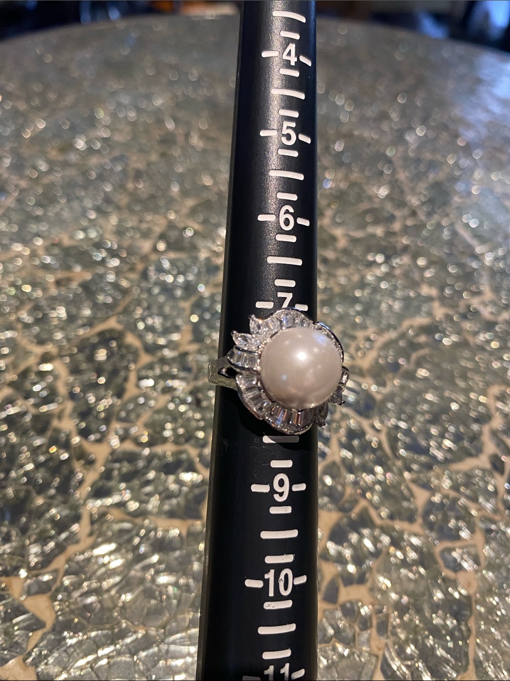 Elegant White Faux Pearl Halo Ring with Silver Accents marked 18KGE